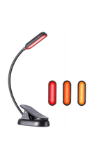 Sarkanās un dzintara gaismas grāmatu lasīšanas lampa